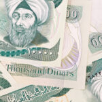 close-up-of-ten-thousand-iraqi-dinar-notes-2026-03-26-10-47-08-utc